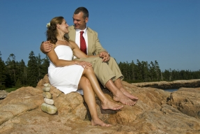 Couple sitting on rocks
